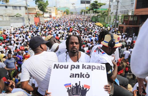 Haïti : Participation de « Izolan » à une manifestation contre la dictature - Haïti, Izolan, Manifestation